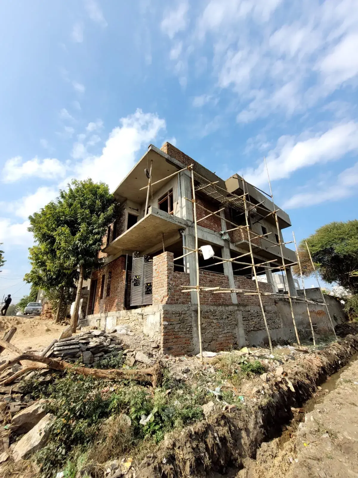 RCC frame, slabs and brickwork during house construction in Udaipur